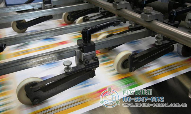 磁性旋转编码器确保印刷设备中同步滚轴的运动