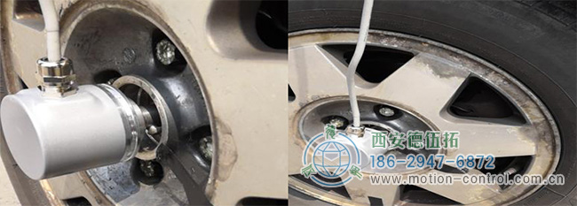 图为编码器测量汽车车轮转速的应用照片